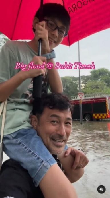 (已签发)柔:狮城二三事:林明伦遇豪雨淹水 背12岁儿涉水脱困