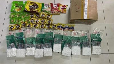 食品包装藏毒闯关失败.关税局古晋机场起获10公斤冰毒