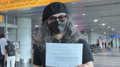 政治漫画家法米禁入境 被令乘下一班机返隆