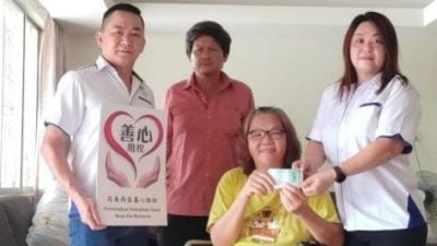 大马善心组织捐款 救济截肢糖尿病妇