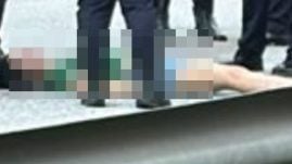女子弃尸大道 | 从行驶中抛下身亡 警逮捕女死者丈夫