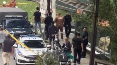 男子闹市吊毙树上 警列猝死案处理