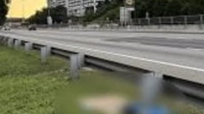 女子弃尸大道 | 从行驶中抛下身亡 警逮捕女死者丈夫
