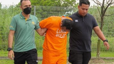 持刀刺伤11岁儿子  巫裔男被延扣7天
