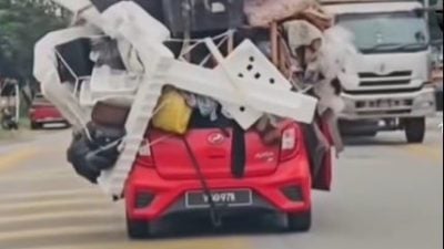 视频| 红Axia超载物品散落马路 网民：大马版“憨豆先生”