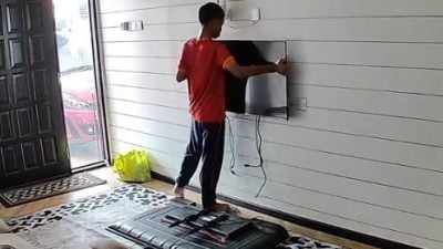 偷偷换下电视 “干案”过程全被录下！