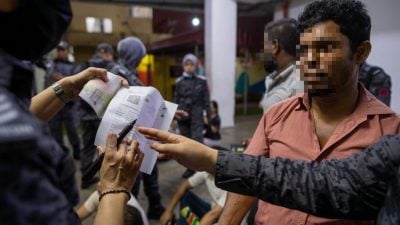 唱不出《Negaraku》 非法移民伪装失败落网