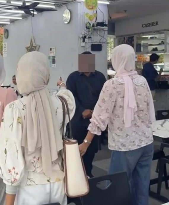 嘛嘛档聚餐遭偷拍? 女子当场揭发报警处理