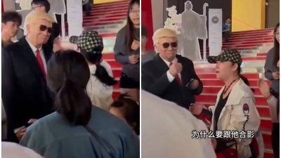 大妈飙骂要求大家别合影 假特朗普尬笑比赞影片疯传