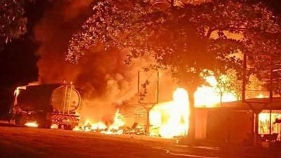 父屋前非法卖汽油 母起火烧烤引爆油槽车 3儿女罹难