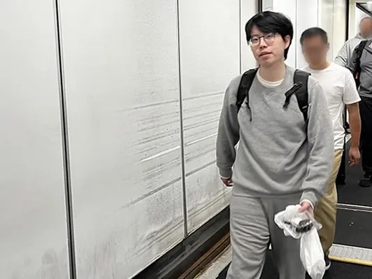 用无人机偷拍美海军舰艇 中国留学生出狱后遭遣返