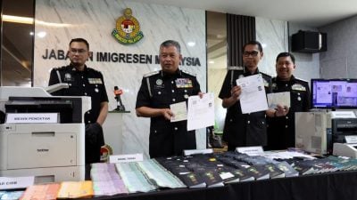 移民局隆2地特别突击   破2伪造外劳准证窝点