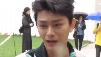 见粉丝争执秒上前劝架 丁禹兮用一把伞化解矛盾
