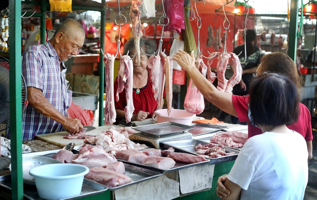霹：封面主文／端午节将至  猪肉涨价推高粽子成本