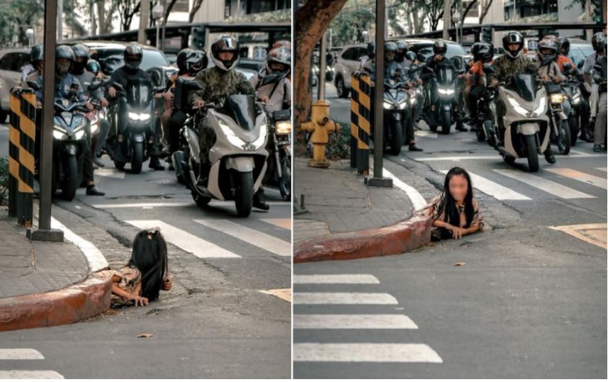 马尼拉闹市 一女子从排水道爬出 “惊悚画面”引热