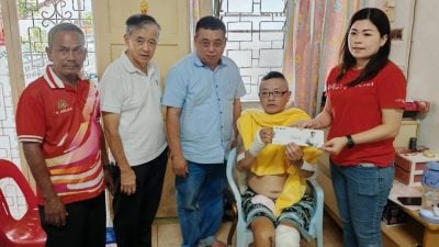 援助受伤遇攫夫妇   邱培栋续跟进案件