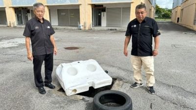 双岛城多处沟盖损坏   4呎深沟渠藏杀机