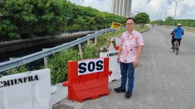 土崩维修期限已过   刘志俍贴“SOS”提醒路人
