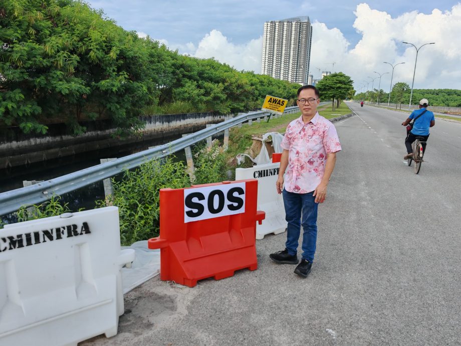 （古城第三版主文）土崩超过一个月维修期限，刘志俍到现场张贴“SOS”