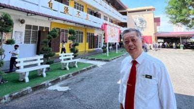 《敬业乐业》“每个孩子皆独特优秀”   韩斌元 躬耕杏坛数十载