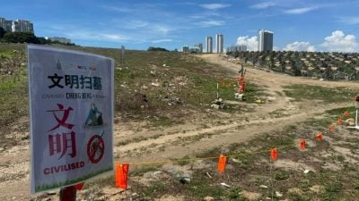 順手帶走不製造垃圾  年輕志工倡導文明清明