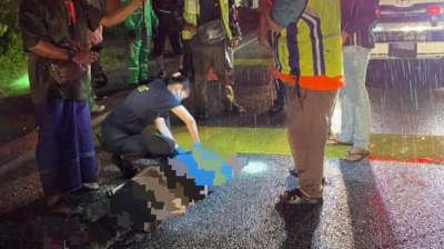 流浪汉过马路被撞毙 身上有近千令吉钞票