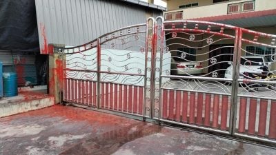 民宅被“點錯相”潑紅漆   村長不排除是追債手段