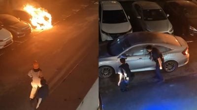 【视频】停车场汽车起火 隔壁车主冒火救车