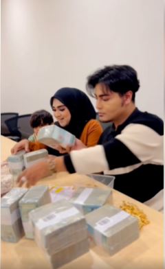 （已签发）炫富或爱妻？ 网红晒财物惹议 