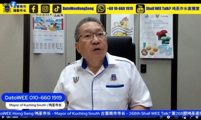 黄鸿圣：执法标准一视同仁 . 公共场地插党旗 须申请