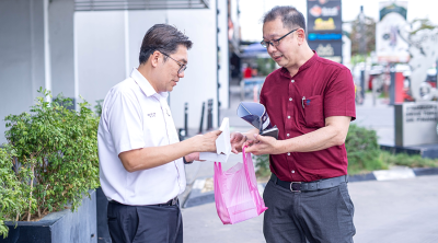 Bayan Baru MP Sim Tze Tzin helps single father with cancer restore insurance premium after three-fold increase