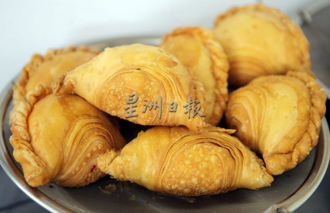 霹／版头／【人气美食】／金黄酥脆香气扑鼻 螺旋咖哩角金典美味