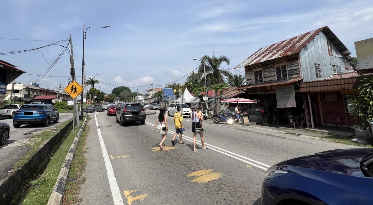 (古城第三版主文)榴梿洞葛十字路口·禁右转措施13日试跑