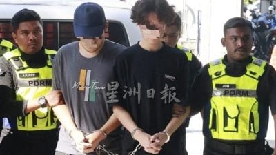 来马被绑架勒索200万涉自导自演 2中国青年押往法庭面控