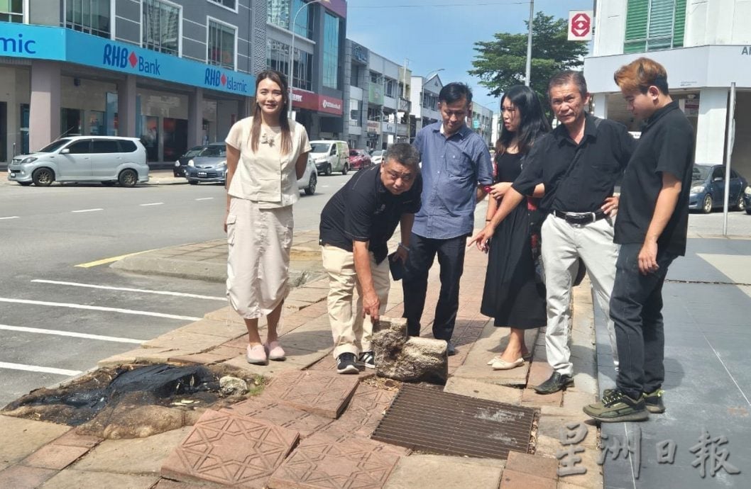 (古城第三版主文/签发)商家建议拆除默迪卡路走道