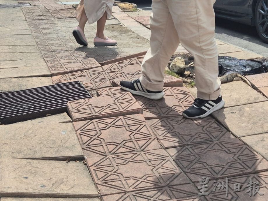 (古城第三版主文/签发)商家建议拆除默迪卡路走道