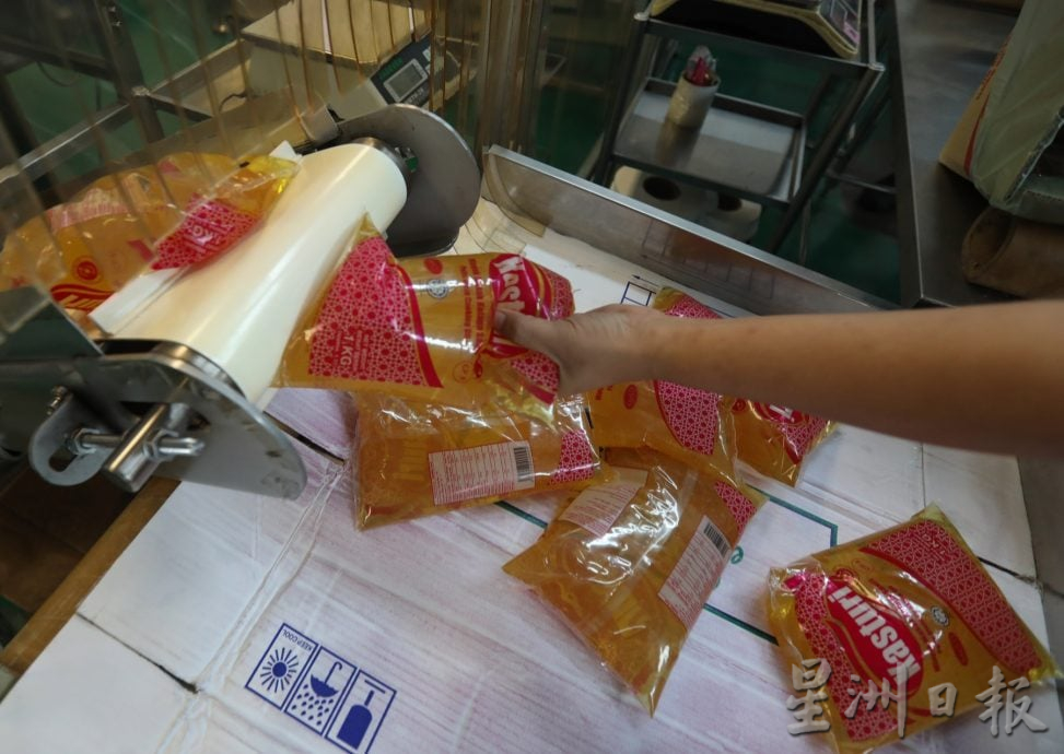 星角摄/图说大马(22日刊):津贴食油包装厂