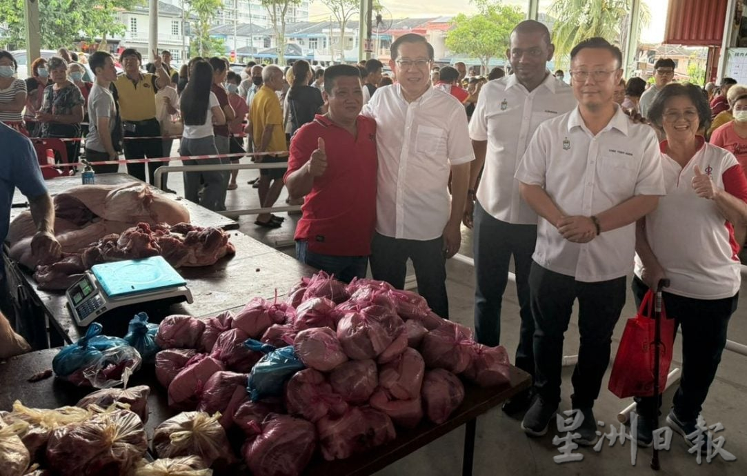 请签发（大北马）北海猪肉大促销吸引近2000人光顾，2小时多售罄