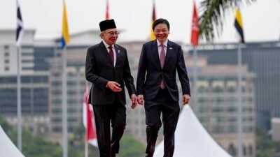 安华与黄循财通话  贺赢大选盼密切合作