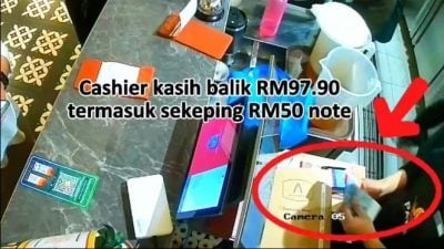 老翁亚庇闹市使诈　找钱后藏起钞票骗钱