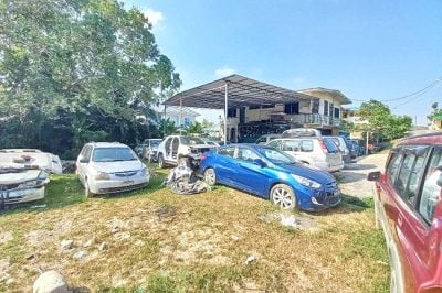 住宅地非法营运 . 修车厂勒令停业
