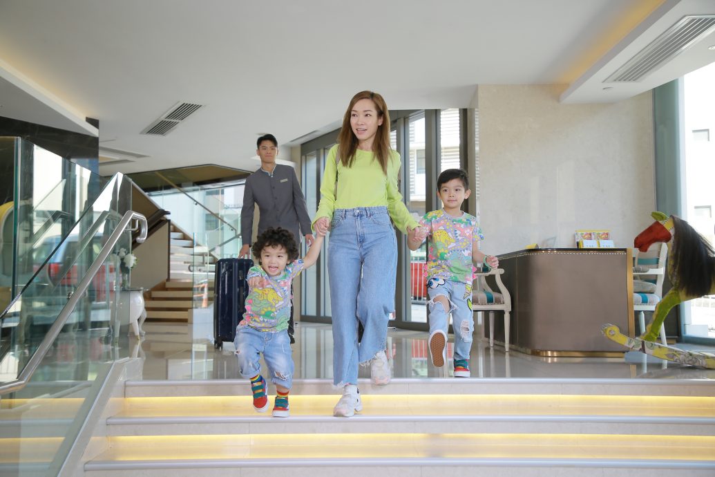 Family checks in to Dorsett Wanchai