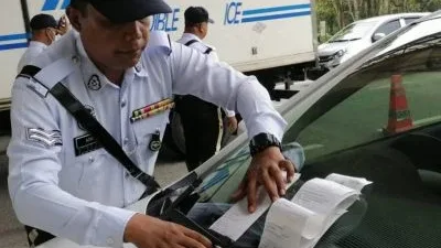 配合司法巡回活动   停车罚单有60%折扣