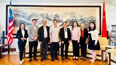 海丝会拜会朱兴龙 共推马中向前发展