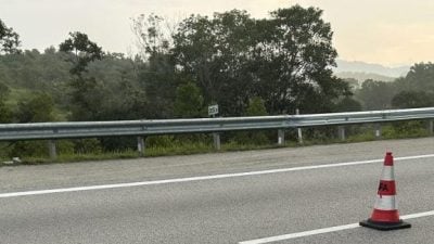 东海岸大道205.6公里轿车与摩托车相撞 骑士当场死亡
