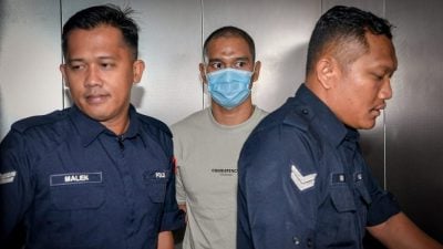 女大学生弃尸油棕园  警员控谋杀不认罪