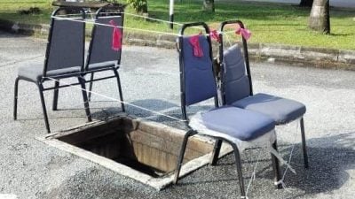 窃贼撬开偷电缆   窨井盖不见现杀人洞