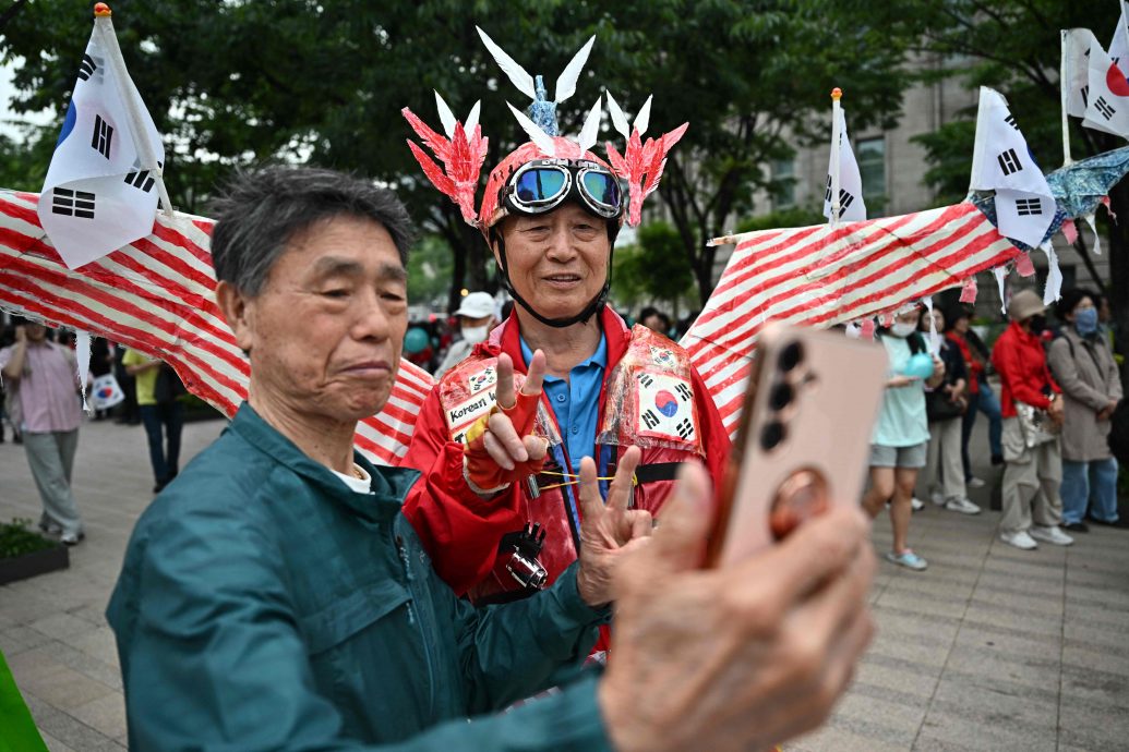 天下事   候选人：攸关国家生存之战  “谁胜都须团结韩社会”  主