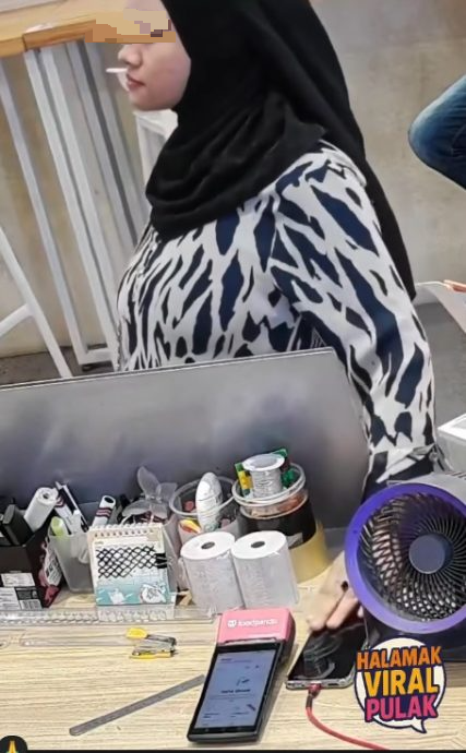 女子店内偷商家手机·电眼全程拍下