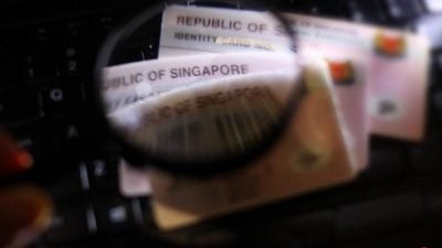 私企受促停用身份证号码验证 狮城政府加强保障个资安全